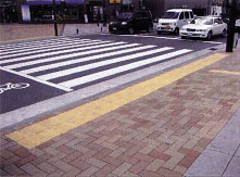 Improvement of level differences and slopes on sidewalks and the installation of guide blocks for visually handicapped people