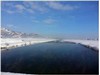全国花火競技大会会場を雄大に流れる雪景色の雄物川