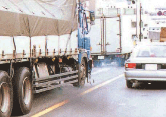 Photo image:Heavy vehicle on road